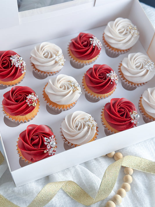 Classic buttercream cupcakes with elegant piped swirls and coordinating sprinkles, handcrafted by Artisan Buttercream in Royal Oak, Michigan.
